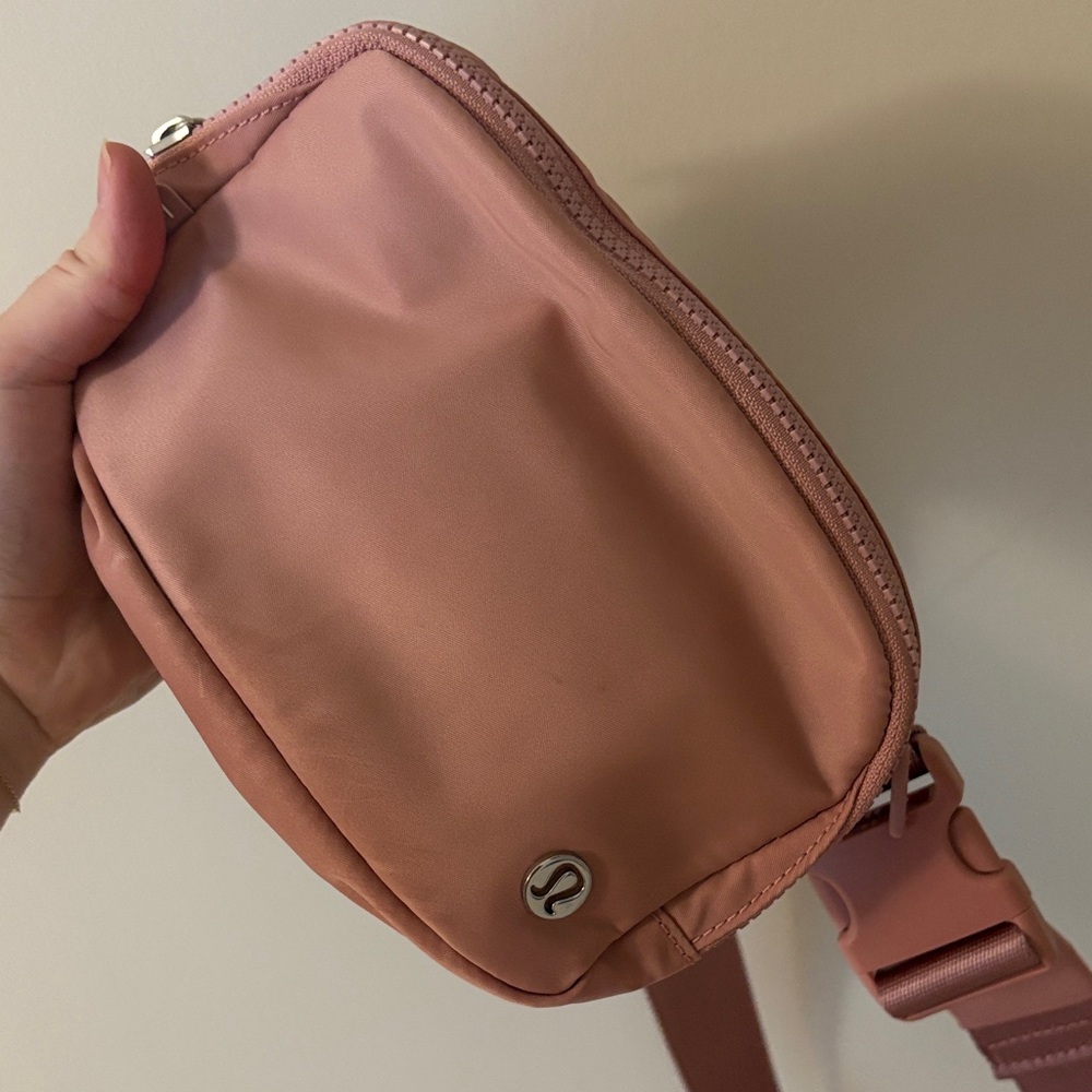 Pink lululemon belt bag slight stain on front